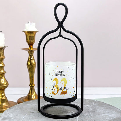 Windlicht von Ritzenhoff mit Geburtstags-Banderole „Happy Birthday“ und goldenen Punkten