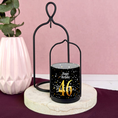 Gesamtansicht: Windlicht mit schwarzem Metallrahmen und Glaszylinder