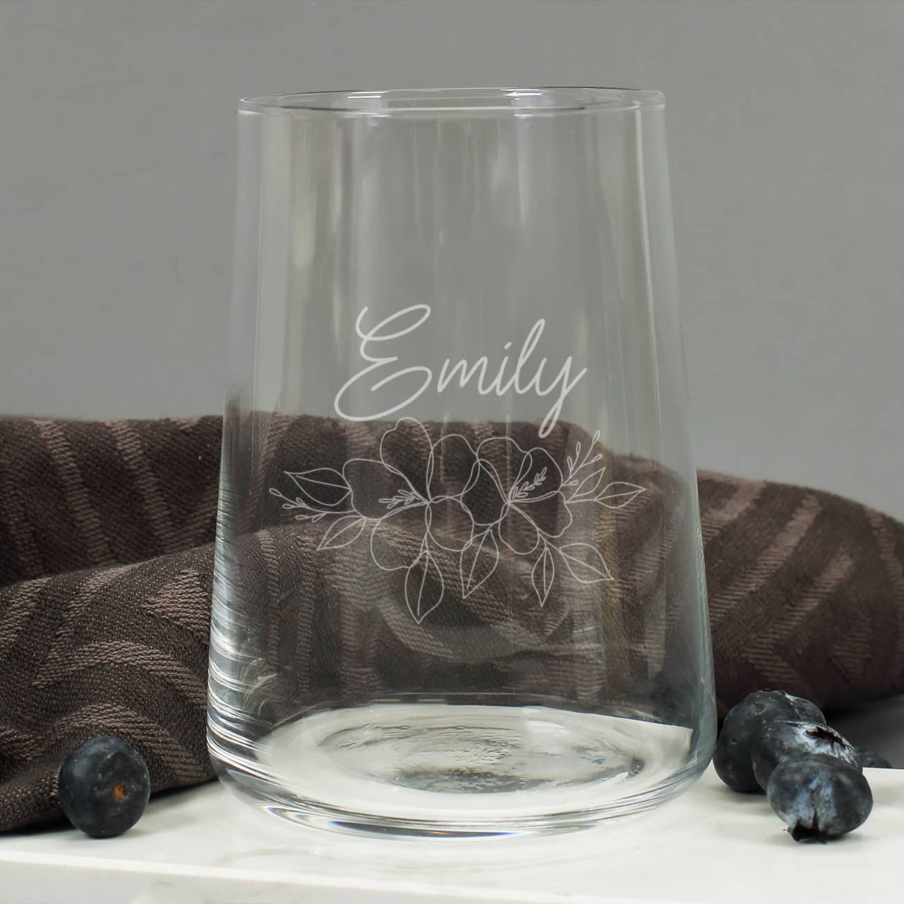 Name & Blumenmotiv als Gravur