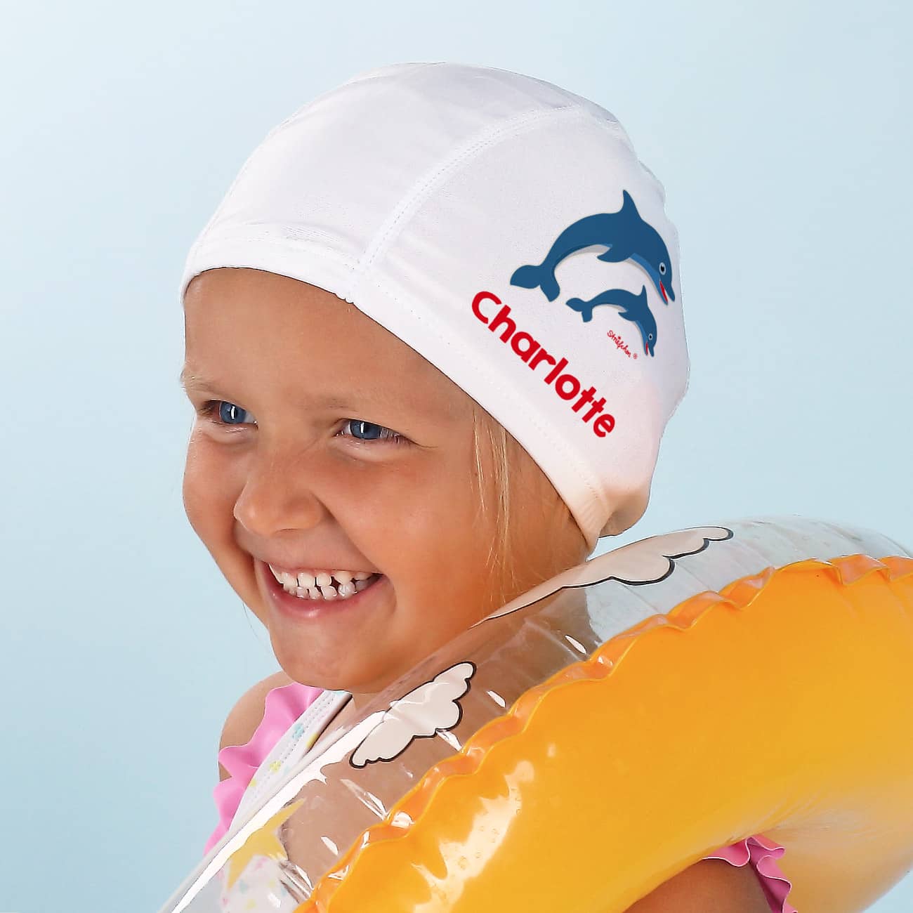 weiße Badekappe mit Delfinen und Wunschname bedruckt
