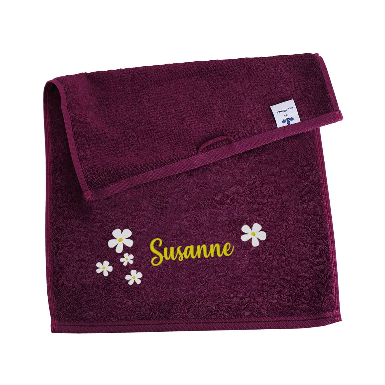 Brombeerfarbenes Gästehandtuch mit Name und Blumen bestickt