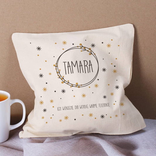 Kirschkernkissen zu Weihnachten mit Schneeflocken, Name und Wunschtext bedruckt