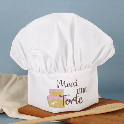 Kochmütze mit Ihrem Wunschnamen und Torte bestickt