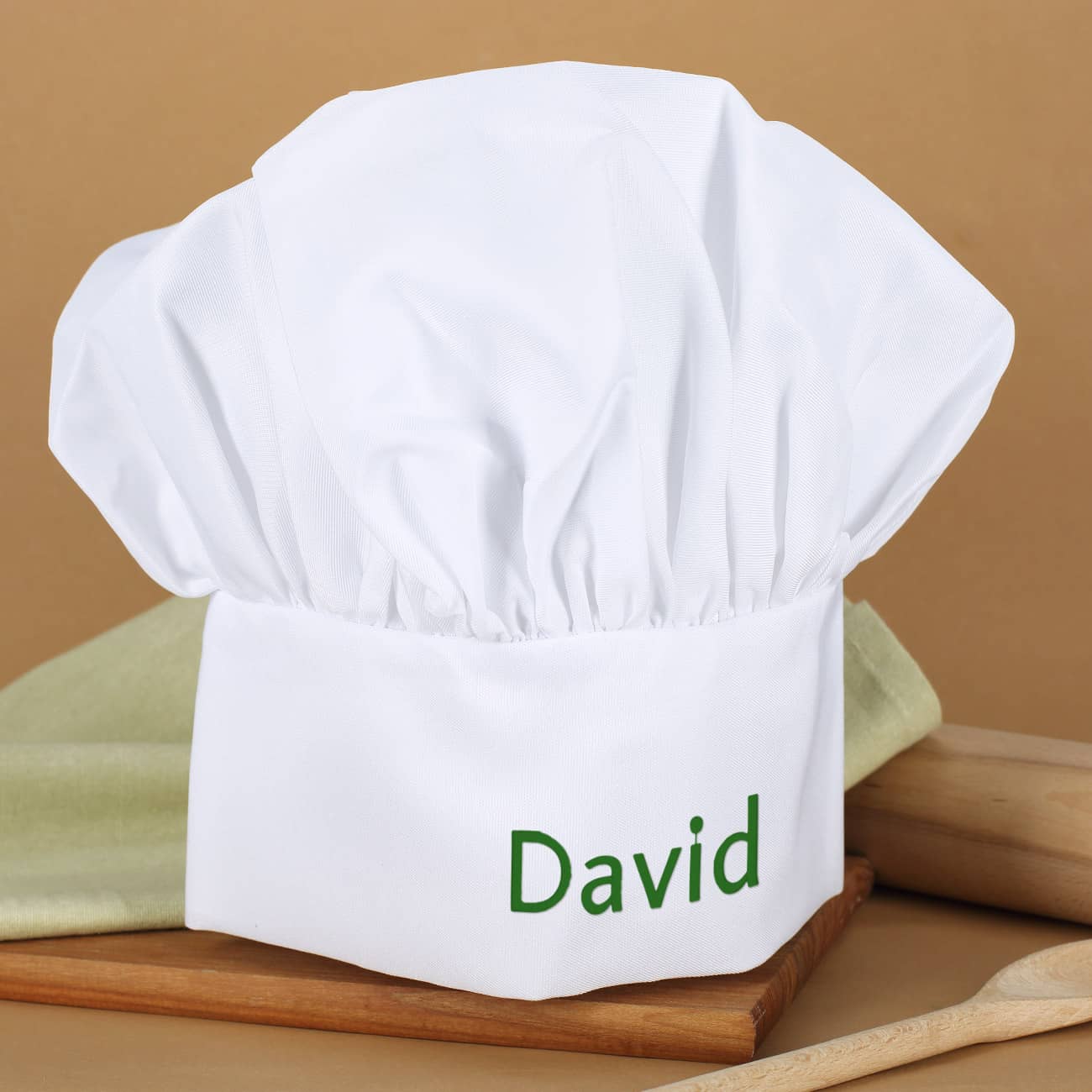 Kochmütze mit einem Namen Ihrer Wahl mit einer schlichten Schrift bestickt