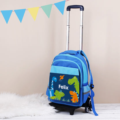 Kindertrolley mit Dino Motiv und Name bedruckt mit ausgezogenem Griff