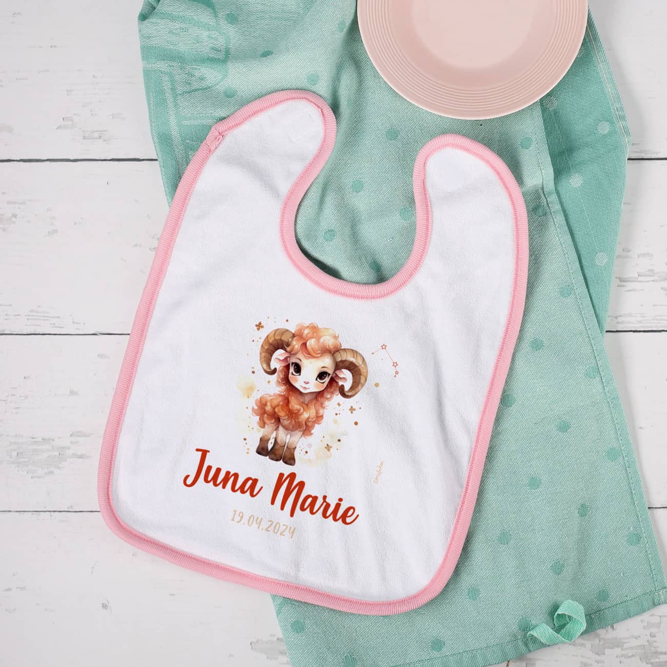 Weiß/rosa Lätzchen mit Sternzeichen, Name und Datum