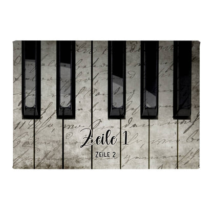 Leinwand mit zwei Zeilen Text und Klaviertasten