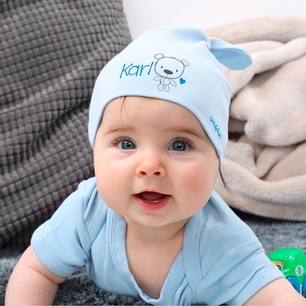 Süße Zipfelmütze für Babys mit Teddymotiv