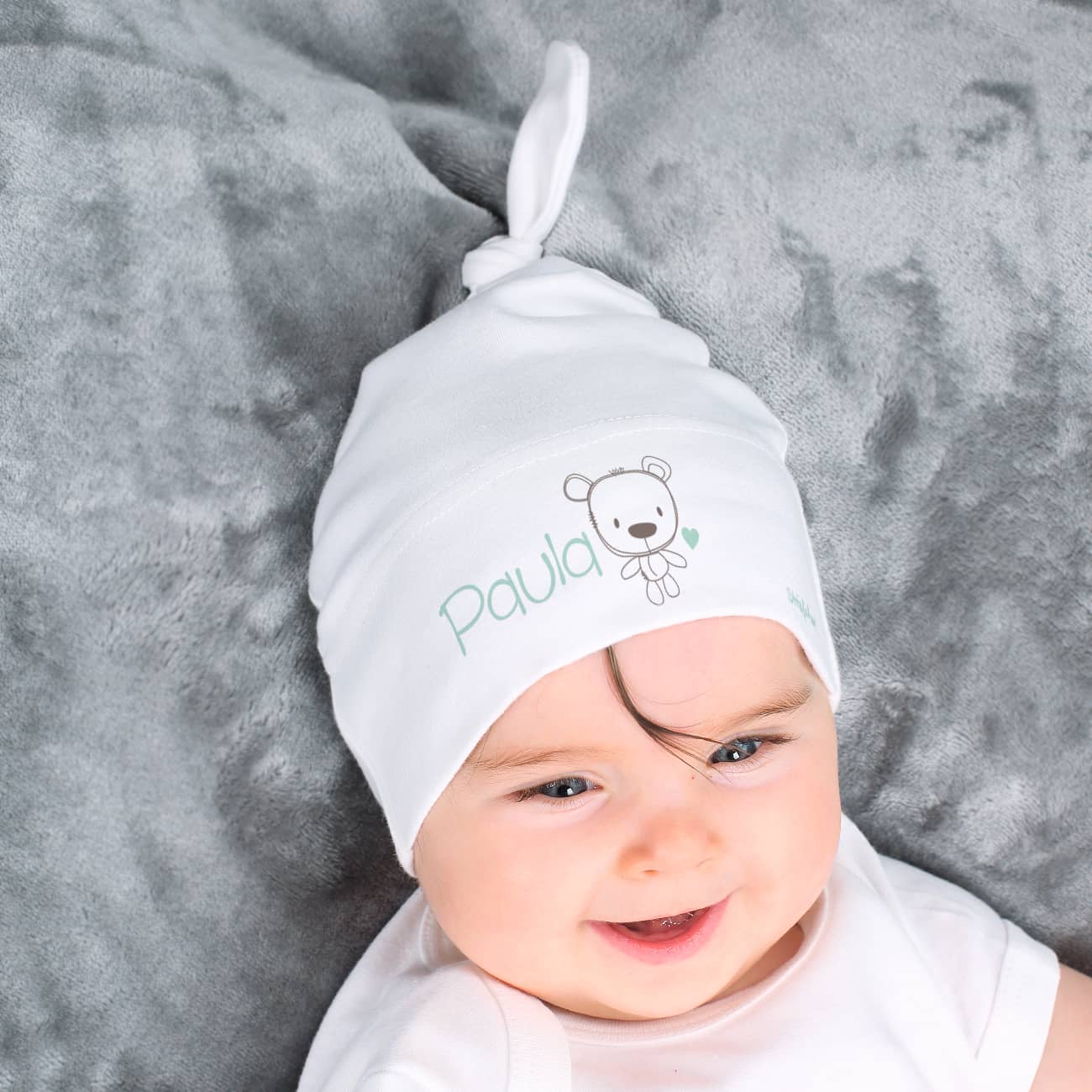 Süße Zipfelmütze für Babys mit Teddymotiv