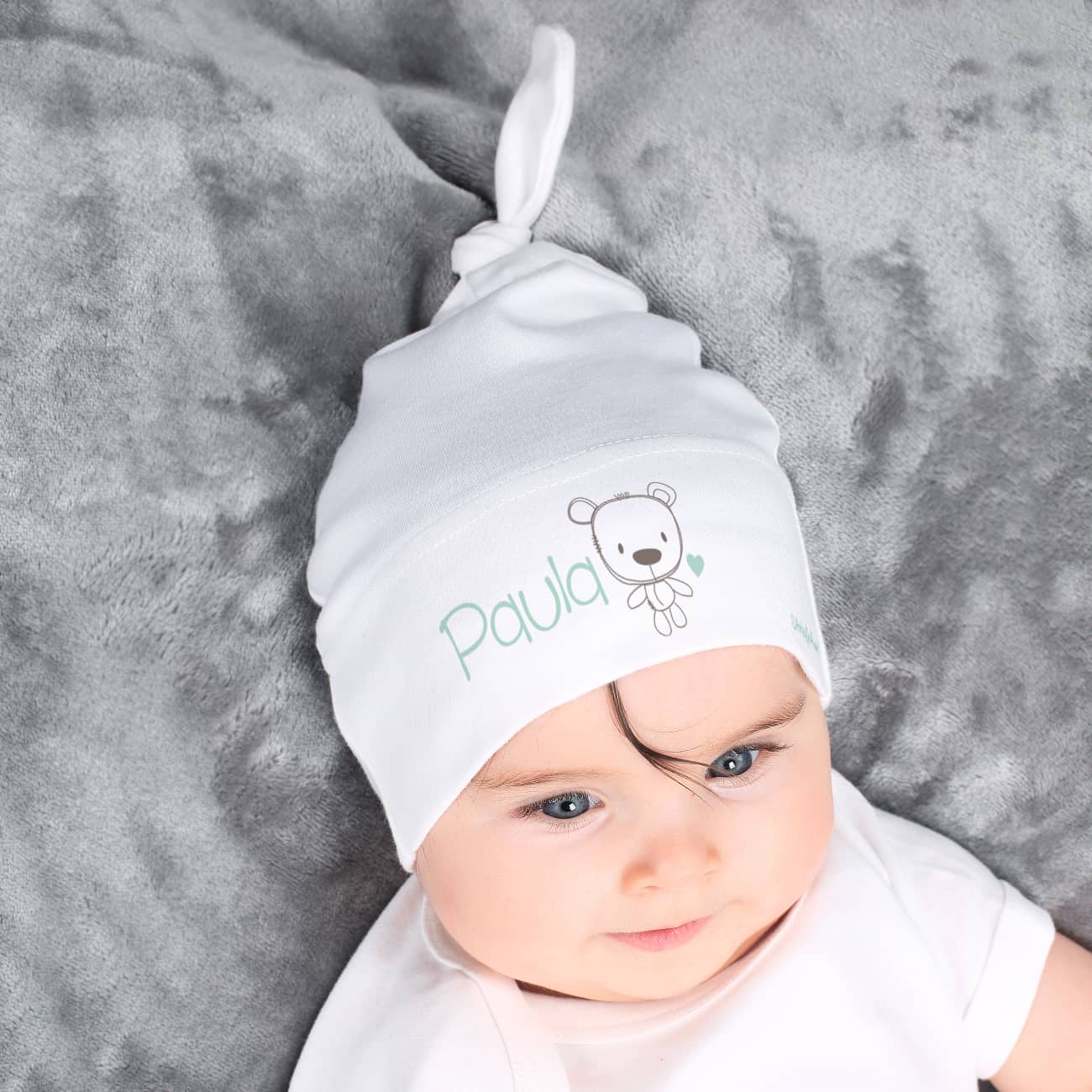 Geschenk zur Geburt - niedliche Zipfelmütze in weiß