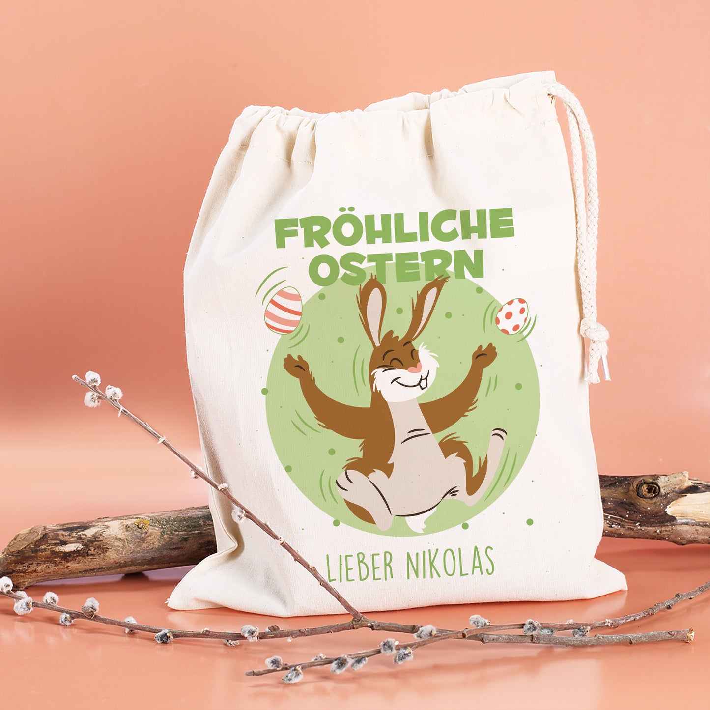 Personalisierter Geschenksack zu Ostern „Fröhliche Ostern“ mit jonglierendem Osterhasen