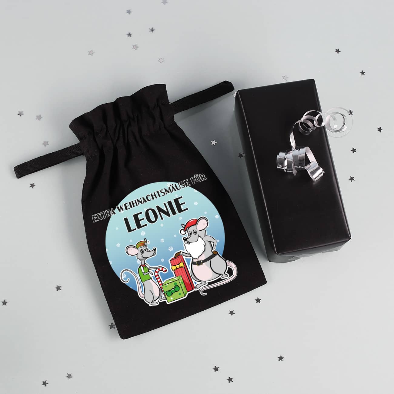 Stoffsack in schwarz als lustige Weihnachtsverpackung für Geldgeschenke