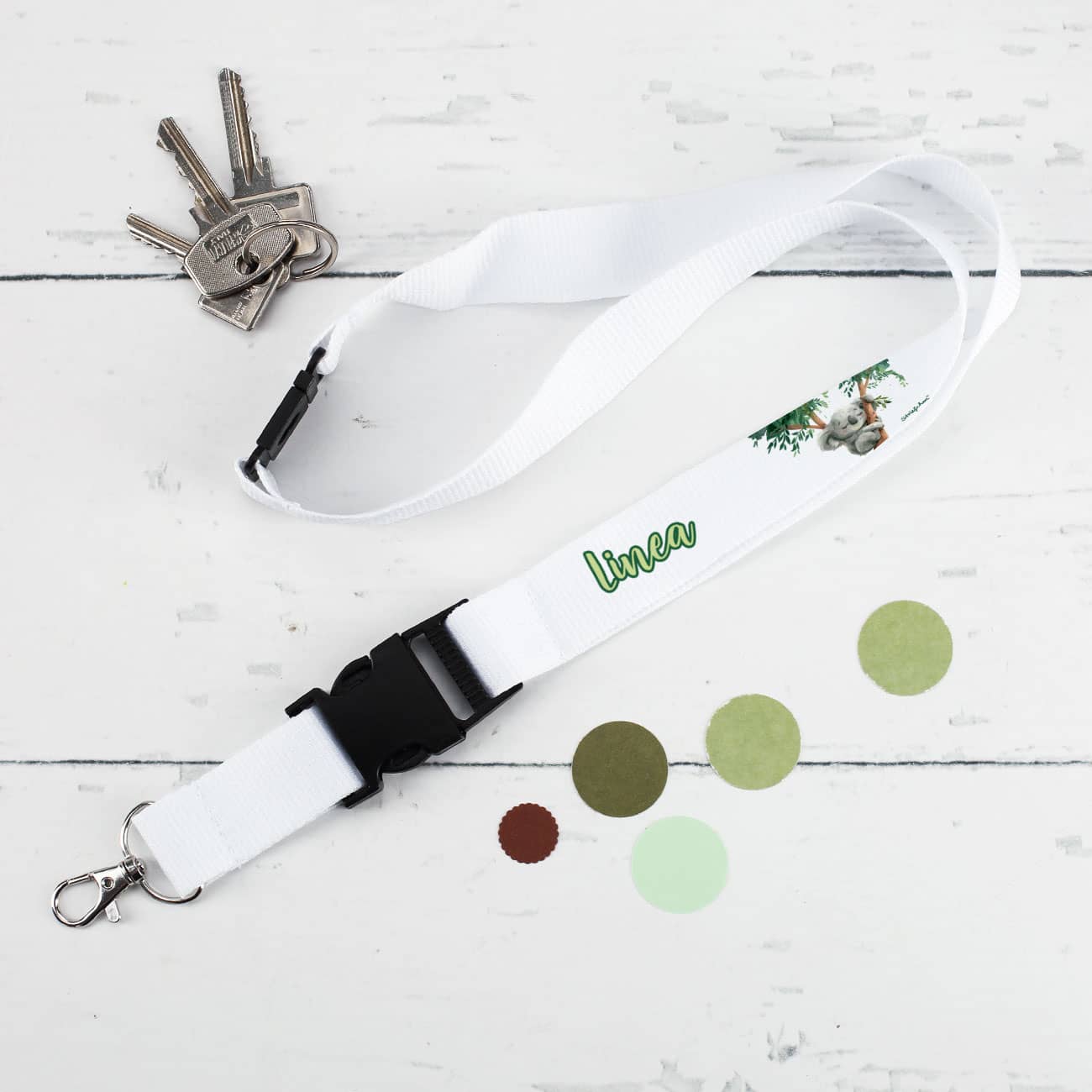 Weißes Schlüsselband mit kleinem Koala als Motiv und Wunschname