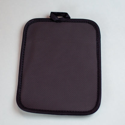 Rückseite eines Topflappens mit strukturierter, rutschfester Silikonfläche