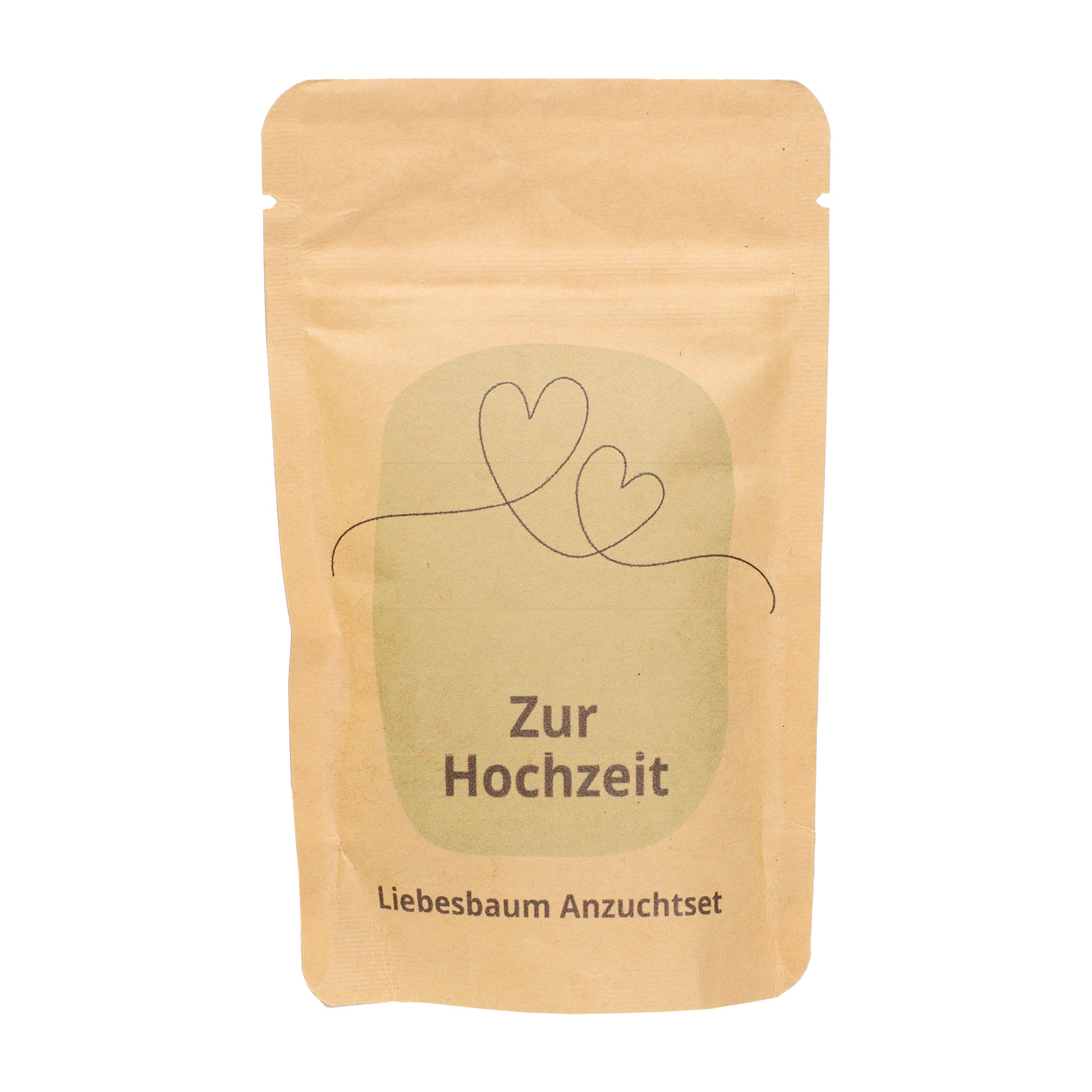 Freigestelltes Zur Hochzeit Anzuchtset in brauner Kraftpapiertüte mit Herzmotiv und Schriftzug Liebesbaum Anzuchtset